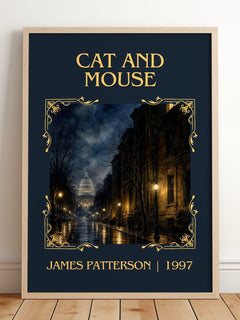 Cat And Mouse Classic Book Art Print by James Patterson – framed print leaning on a wooden floor