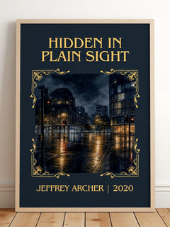 Hidden In Plain Sight Classic Book Art Print by Jeffrey Archer – framed print leaning on a wooden floor