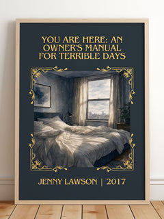 You Are Here: An Owner's Manual For Terrible Days Classic Book Art Print by Jenny Lawson – framed print leaning on a wooden floor