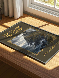 The Island Of Sheep Classic Book Art Print by John Buchan – print on a sunlit desk