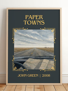 Paper Towns Classic Book Art Print by John Green – framed print leaning on a wooden floor