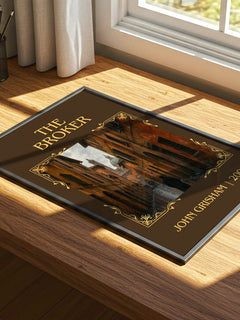 The Broker Classic Book Art Print by John Grisham – print on a sunlit desk