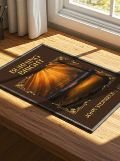 Burning Bright Classic Book Art Print by John Steinbeck – print on a sunlit desk