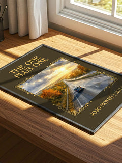 The One Plus One Classic Book Art Print by Jojo Moyes – print on a sunlit desk