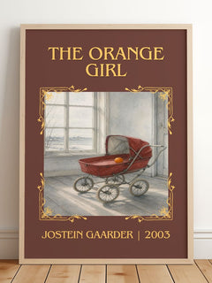 The Orange Girl Classic Book Art Print by Jostein Gaarder – framed print leaning on a wooden floor