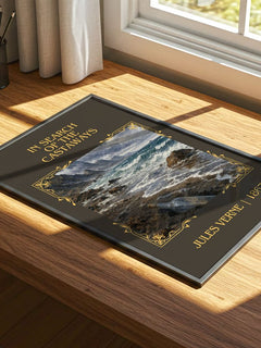In Search Of The Castaways Classic Book Art Print by Jules Verne – print on a sunlit desk