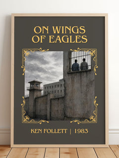 On Wings Of Eagles Classic Book Art Print by Ken Follett – framed print leaning on a wooden floor