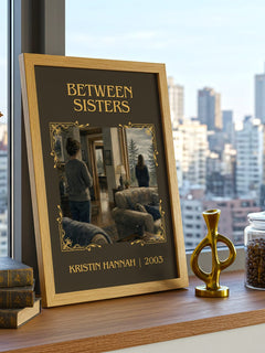 Between Sisters Classic Book Art Print by Kristin Hannah – framed print on a city-view windowsill