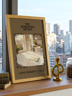 The Husband's Secret Classic Book Art Print by Liane Moriarty – framed print on a city-view windowsill