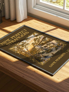 Nine Perfect Strangers Classic Book Art Print by Liane Moriarty – print on a sunlit desk