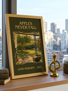 Apples Never Fall Classic Book Art Print by Liane Moriarty – framed print on a city-view windowsill