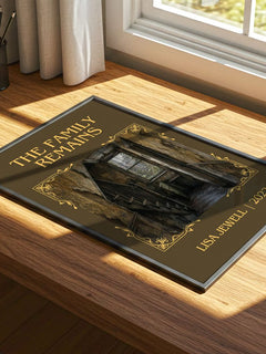 The Family Remains Classic Book Art Print by Lisa Jewell – print on a sunlit desk