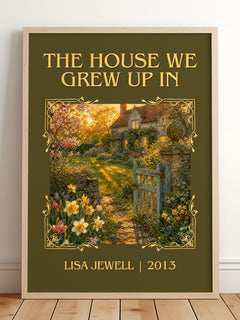 The House We Grew Up In Classic Book Art Print by Lisa Jewell – framed print leaning on a wooden floor