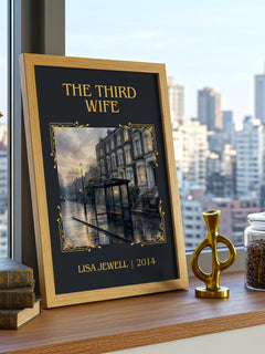 The Third Wife Classic Book Art Print by Lisa Jewell – framed print on a city-view windowsill