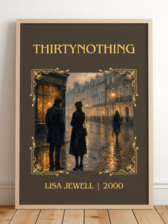 Thirtynothing Classic Book Art Print by Lisa Jewell – framed print leaning on a wooden floor