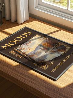 Moods Classic Book Art Print by Louisa May Alcott – print on a sunlit desk