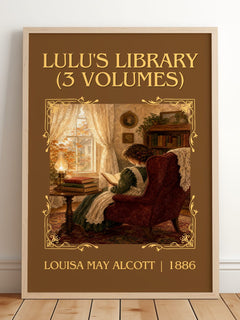 Lulu's Library (3 Volumes) Classic Book Art Print by Louisa May Alcott – framed print leaning on a wooden floor