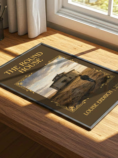 The Round House Classic Book Art Print by Louise Erdrich – print on a sunlit desk