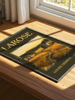 Larose Classic Book Art Print by Louise Erdrich – print on a sunlit desk