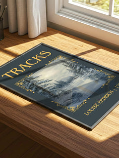 Tracks Classic Book Art Print by Louise Erdrich – print on a sunlit desk