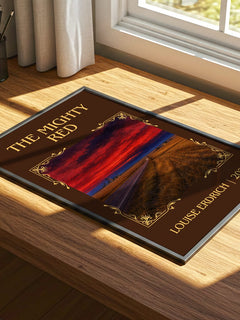 The Mighty Red Classic Book Art Print by Louise Erdrich – print on a sunlit desk