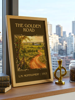 The Golden Road Classic Book Art Print by L.M. Montgomery – framed print on a city-view windowsill