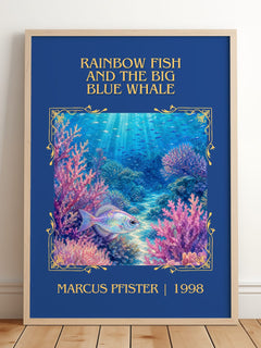 Rainbow Fish And The Big Blue Whale Classic Book Art Print by Marcus Pfister – framed print leaning on a wooden floor
