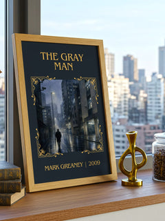 The Gray Man Classic Book Art Print by Mark Greaney – framed print on a city-view windowsill