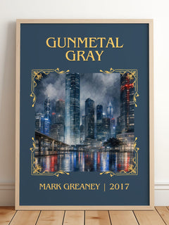 Gunmetal Gray Classic Book Art Print by Mark Greaney – framed print leaning on a wooden floor