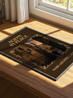 Agent In Place Classic Book Art Print by Mark Greaney – print on a sunlit desk