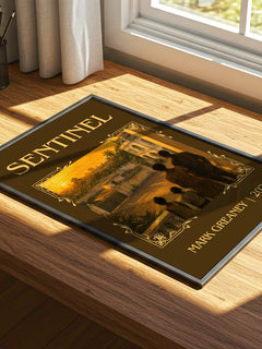 Sentinel Classic Book Art Print by Mark Greaney – print on a sunlit desk