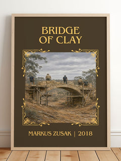 Bridge Of Clay Classic Book Art Print by Markus Zusak – framed print leaning on a wooden floor