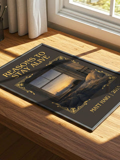 Reasons To Stay Alive Classic Book Art Print by Matt Haig – print on a sunlit desk