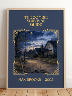 The Zombie Survival Guide Classic Book Art Print by Max Brooks – framed print leaning on a wooden floor