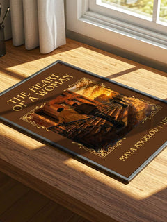The Heart Of A Woman Classic Book Art Print by Maya Angelou – print on a sunlit desk