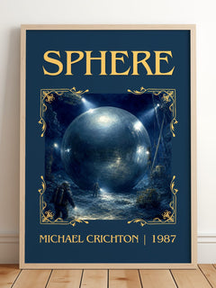 Sphere Classic Book Art Print by Michael Crichton – framed print leaning on a wooden floor