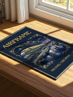 Airframe Classic Book Art Print by Michael Crichton – print on a sunlit desk