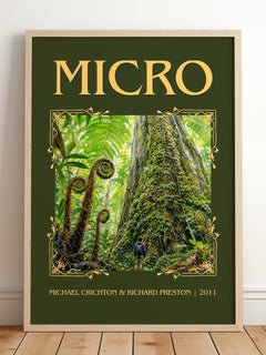 Micro Classic Book Art Print by Michael Crichton & Richard Preston – framed print leaning on a wooden floor
