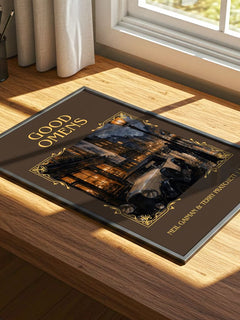 Good Omens Classic Book Art Print by Neil Gaiman & Terry Pratchett – print on a sunlit desk
