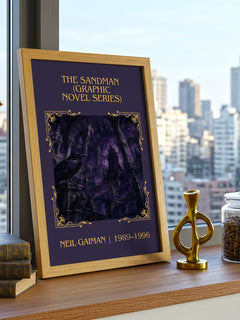 Sandman (Graphic Novel Series) Classic Book Art Print by Neil Gaiman – framed print on a city-view windowsill