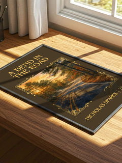 A Bend In The Road Classic Book Art Print by Nicholas Sparks – print on a sunlit desk