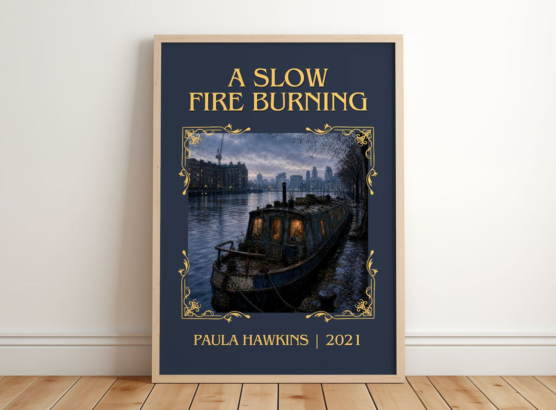 A Slow Fire Burning Classic Book Art Print by Paula Hawkins – framed print leaning on a wooden floor