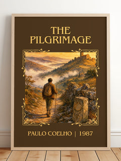 The Pilgrimage Classic Book Art Print by Paulo Coelho – framed print leaning on a wooden floor