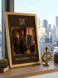 The Spy Classic Book Art Print by Paulo Coelho – framed print on a city-view windowsill