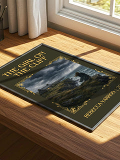 The Girl On The Cliff Classic Book Art Print by Rebecca Yarros – print on a sunlit desk