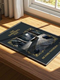 The Shrinking Man Classic Book Art Print by Richard Matheson – print on a sunlit desk