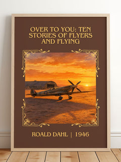 Over To You: Ten Stories Of Flyers And Flying Classic Book Art Print by Roald Dahl – framed print leaning on a wooden floor