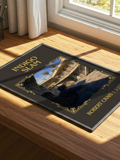 Indigo Slam Classic Book Art Print by Robert Crais – print on a sunlit desk