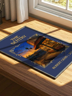 The Sentry Classic Book Art Print by Robert Crais – print on a sunlit desk