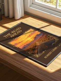 The Road Ahead Classic Book Art Print by Robert Crais – print on a sunlit desk